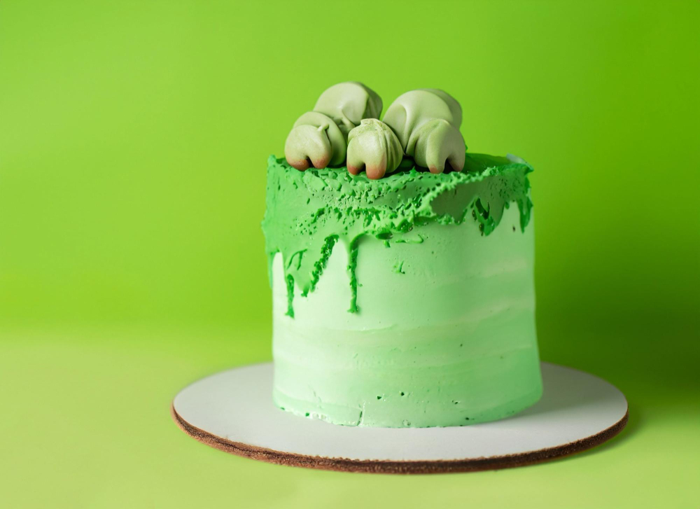 Green Monster Teeth Drip Cake – Spooky Green Frosted Cake with Fondant Teeth Toppe